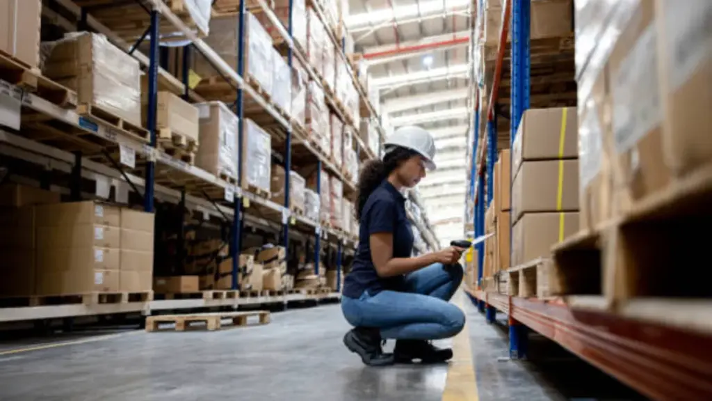 warehouse staff making an inventory and check goods