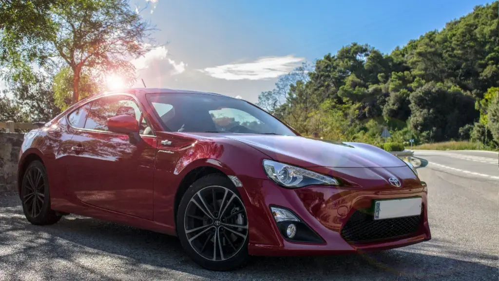 a close up of red toyota