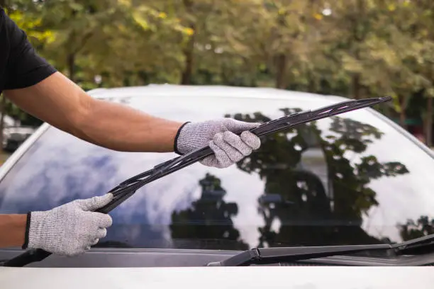 replace new wiper blades for car during the rainy season