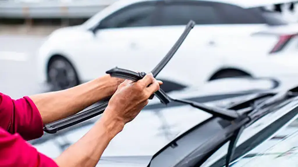 Replacing worn out windshield wiper blade
